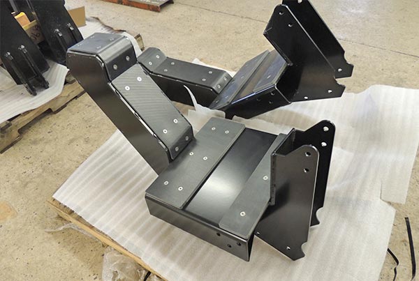 Spray boom boom cradle