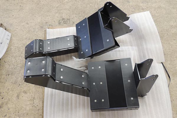 Spray boom boom cradle