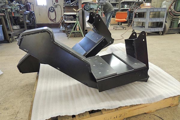 Spray boom boom cradle
