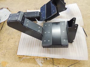 Boom cradle for agricultural spray booms